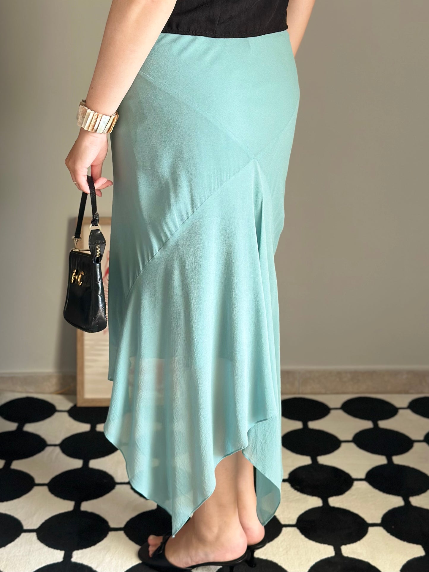 Asymmetrical silk turquoise skirt by Pearce Fionda brand