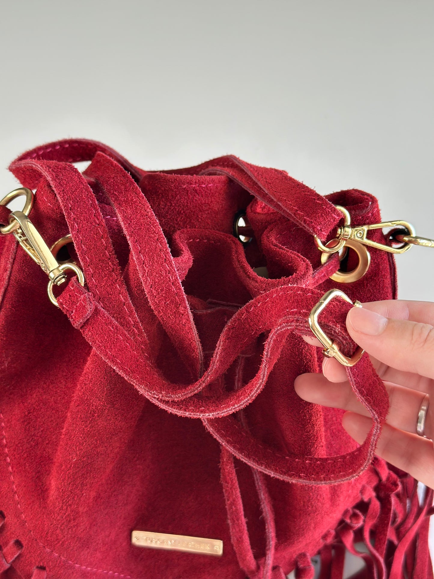 Dark red vintage suede bucket bag