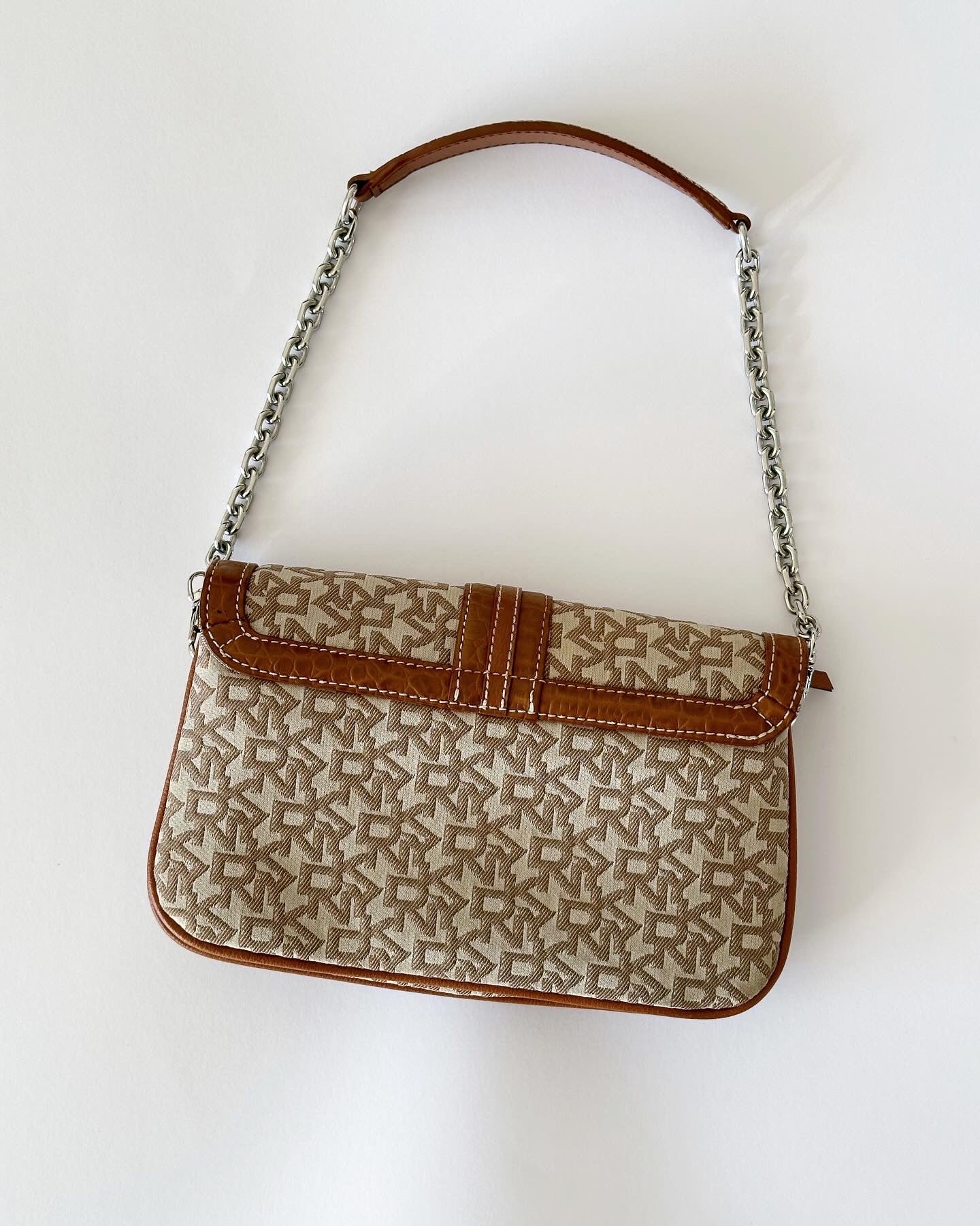 Trendy vintage DKNY mini baguette bag with monogram print