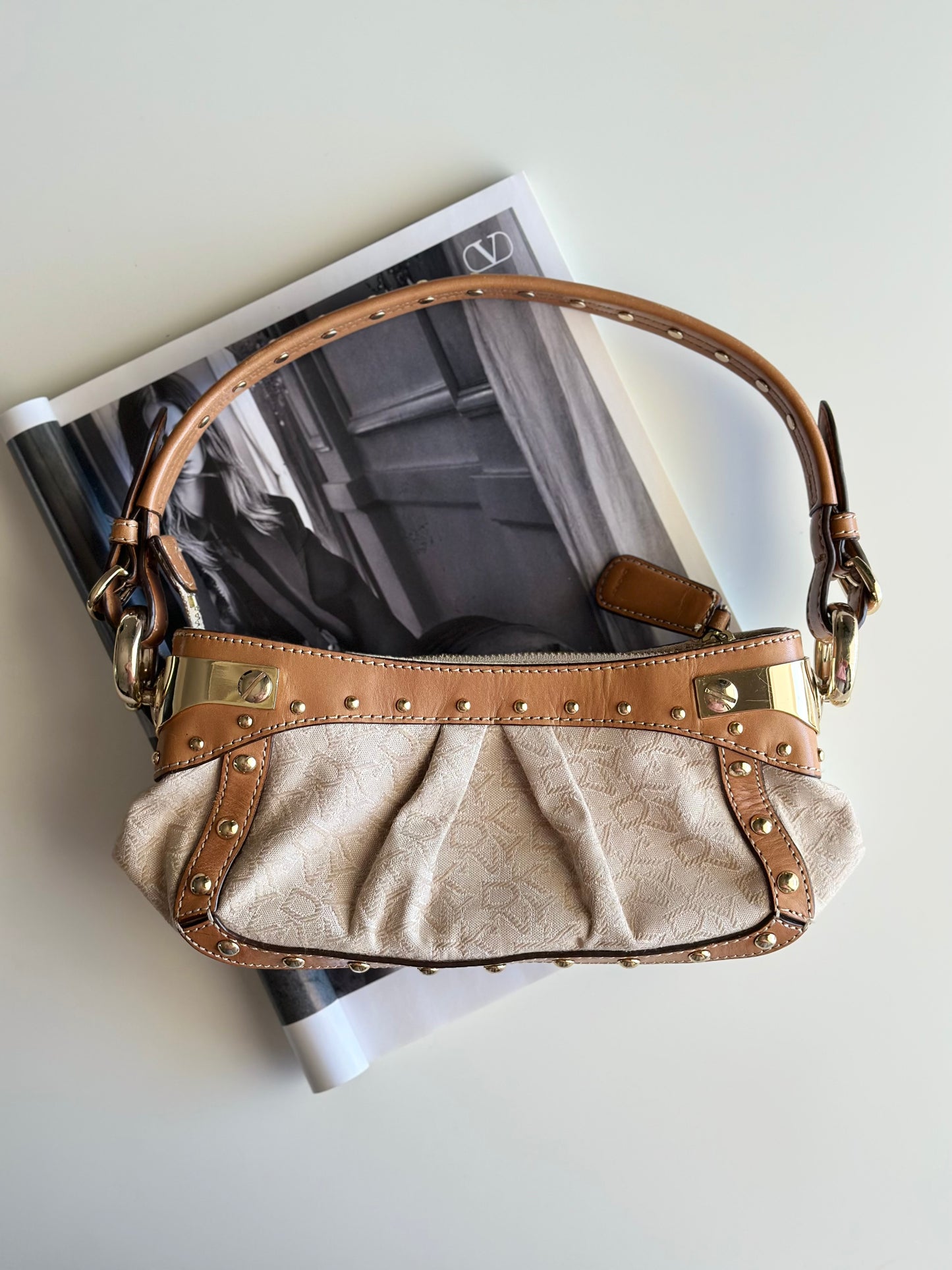 Vintage chic DKNY small bag with edgy details