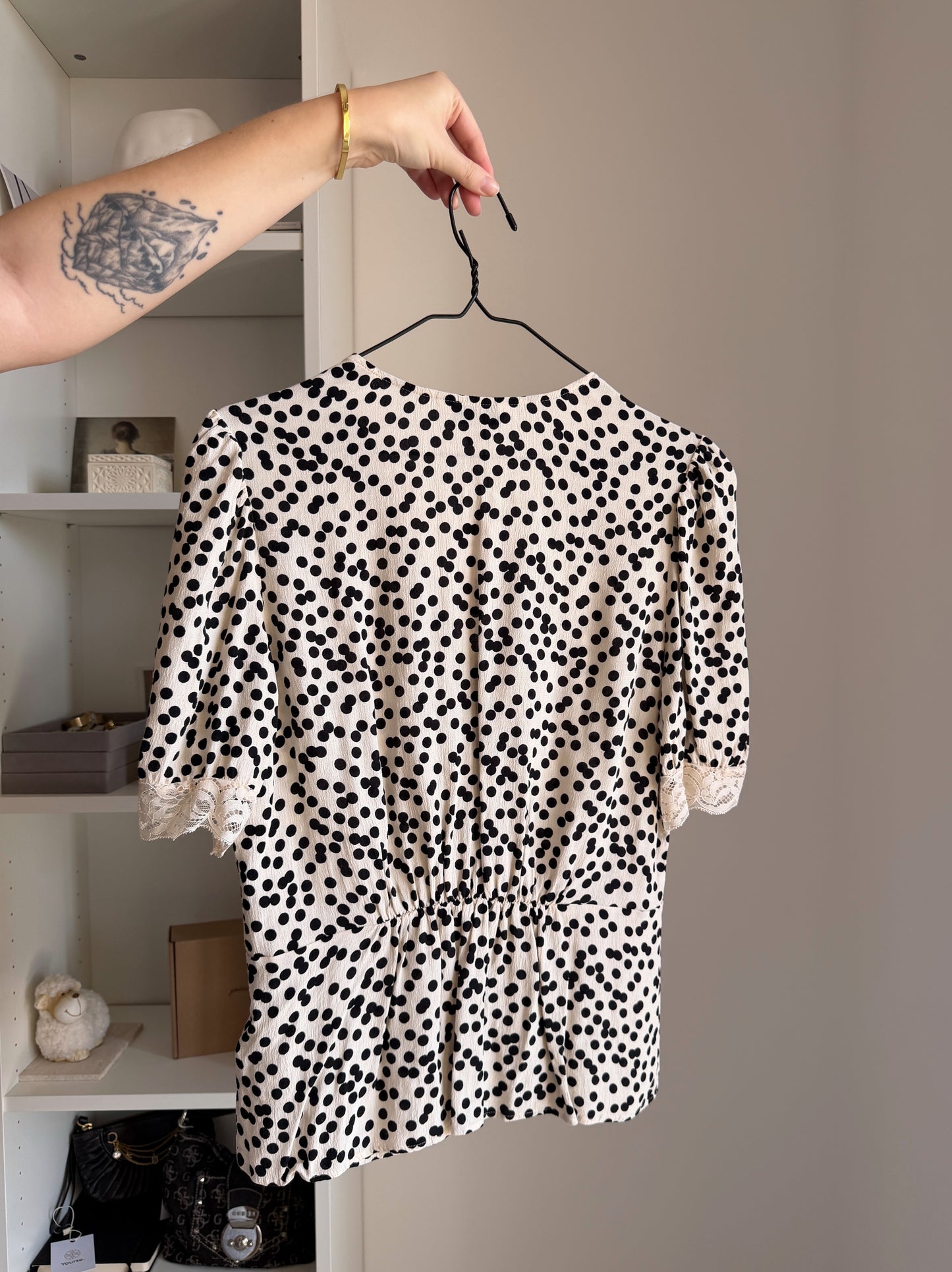 Polka dot blouse with lace
