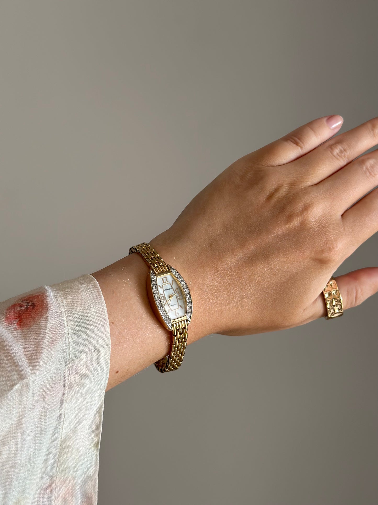 Beautiful gold-tone Embassy watch with crystals