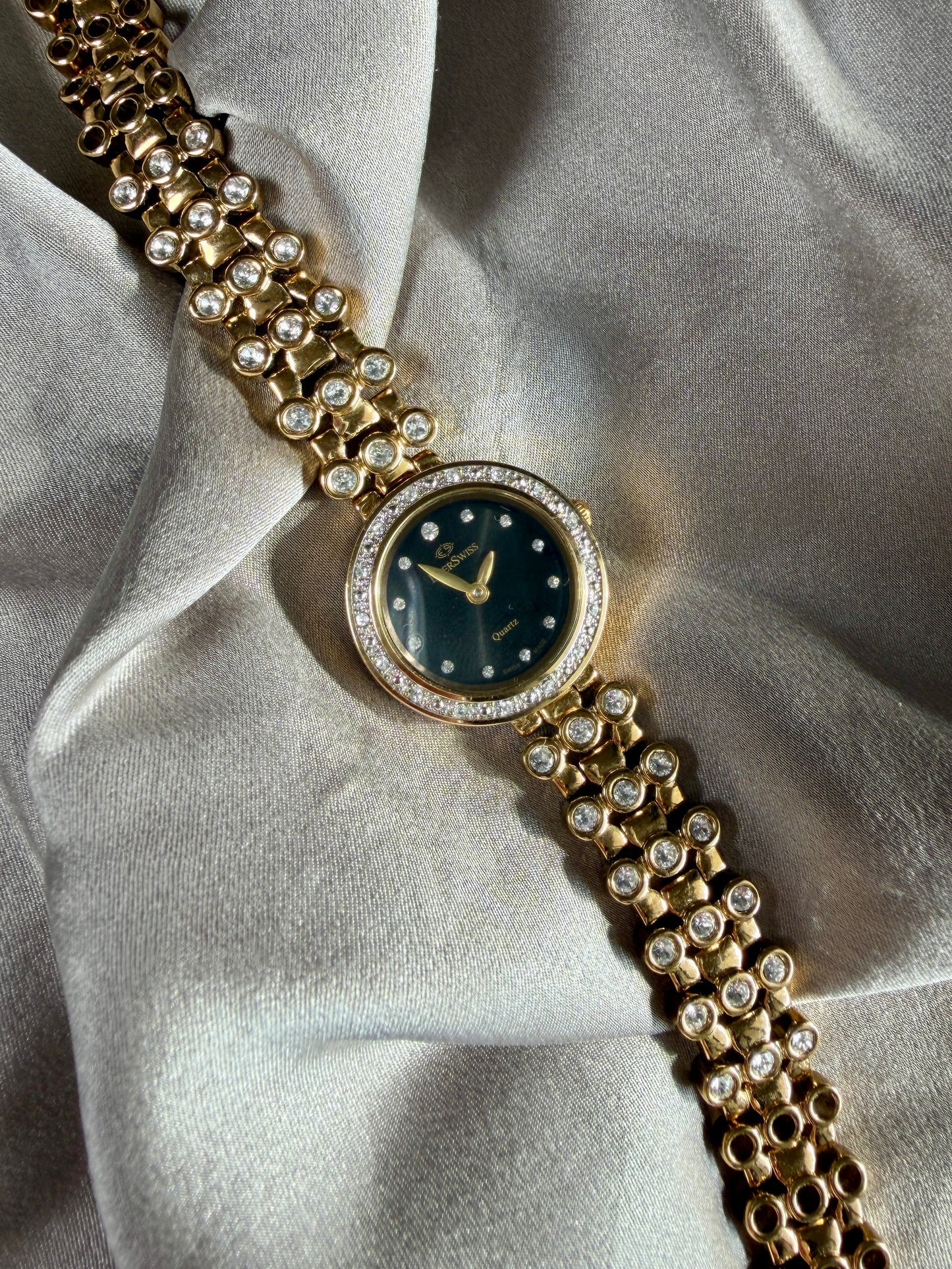 Elegant vintage gold-tone watch EverSwiss with black dial