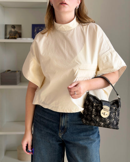 Minimalist cotton top in a soft cream shade