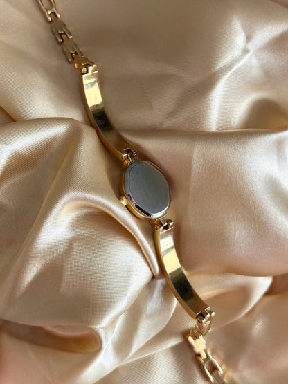 Charming vintage gold-tone watch with crystals