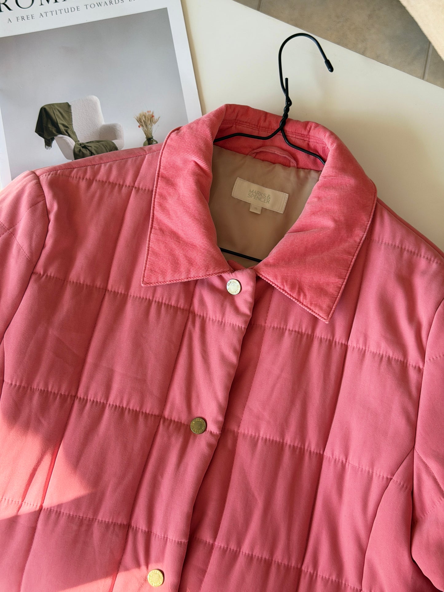 Charming quilted jacket in a soft coral pink shade