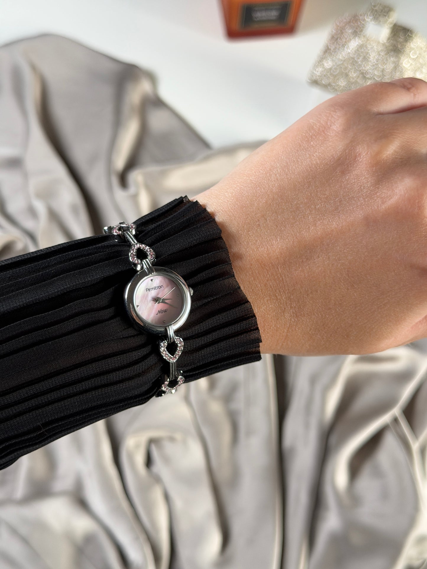 Charming vintage Armitron watch with heart links