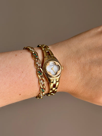 Charming vintage Accurist watch with 4 interchangeable bezels