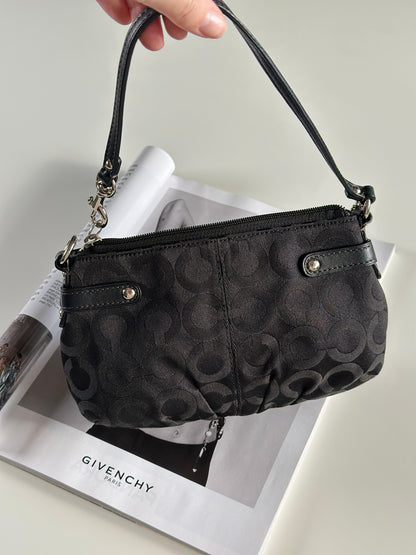 Timeless vintage authentic Coach wristlet bag