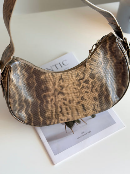 Stylish vintage DKNY shoulder bag in a snakeskin pattern