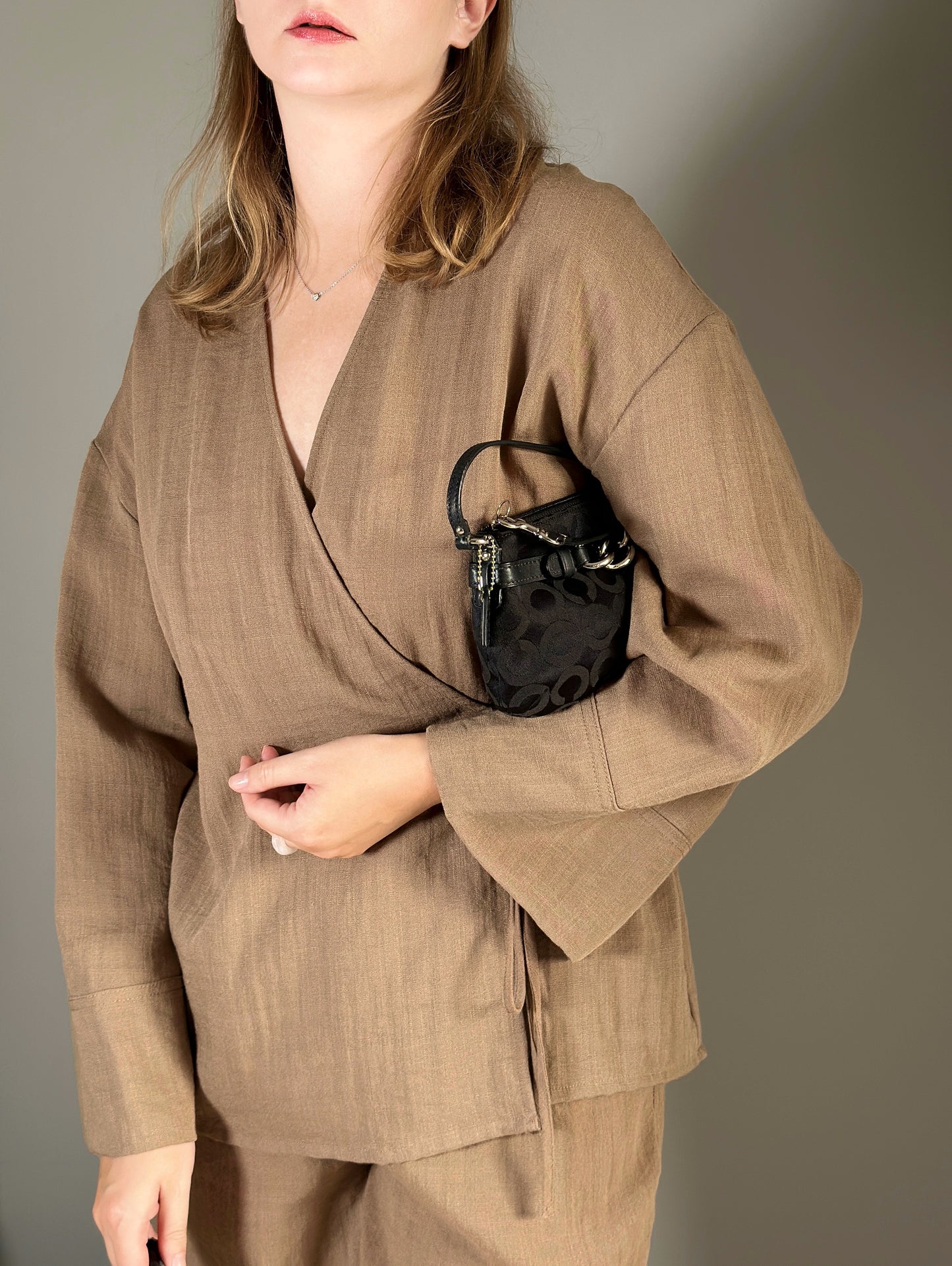 Timeless vintage authentic Coach wristlet bag