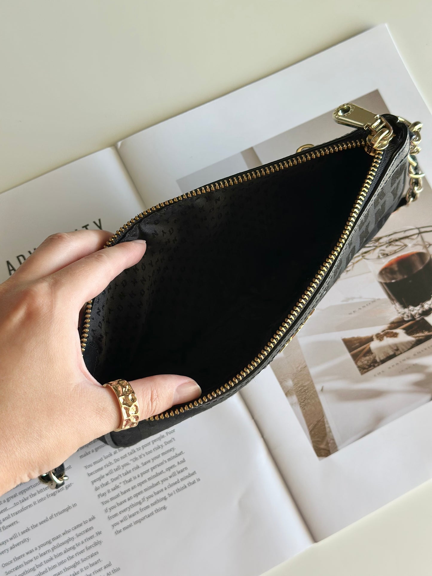 Stunning pre-loved black DKNY baguette bag