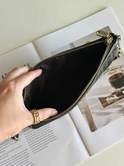 Stunning pre-loved black DKNY baguette bag