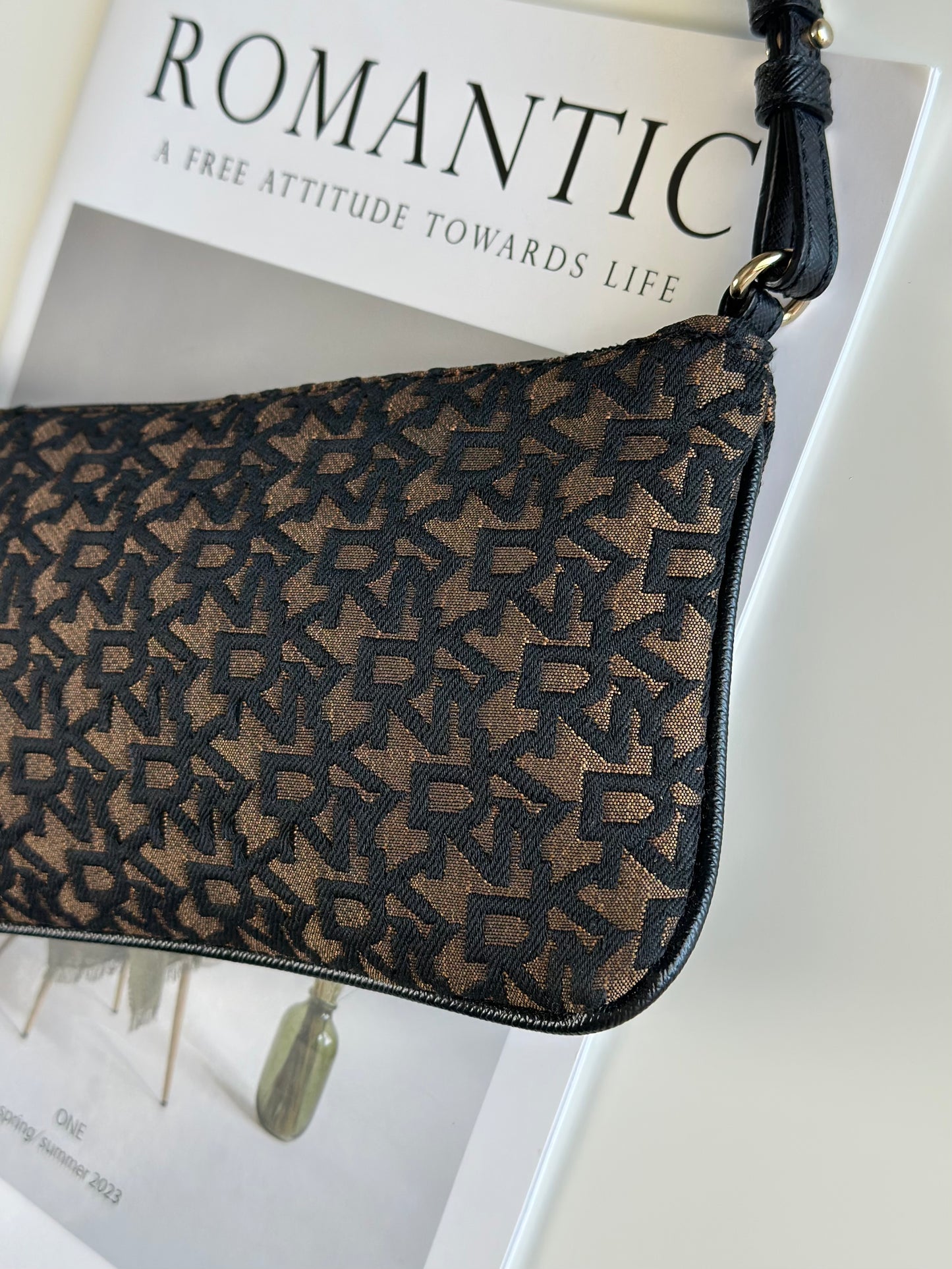 Stylish vintage DKNY baguette bag in bronze and black