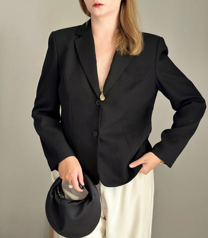 Striking vintage black blazer with open back
