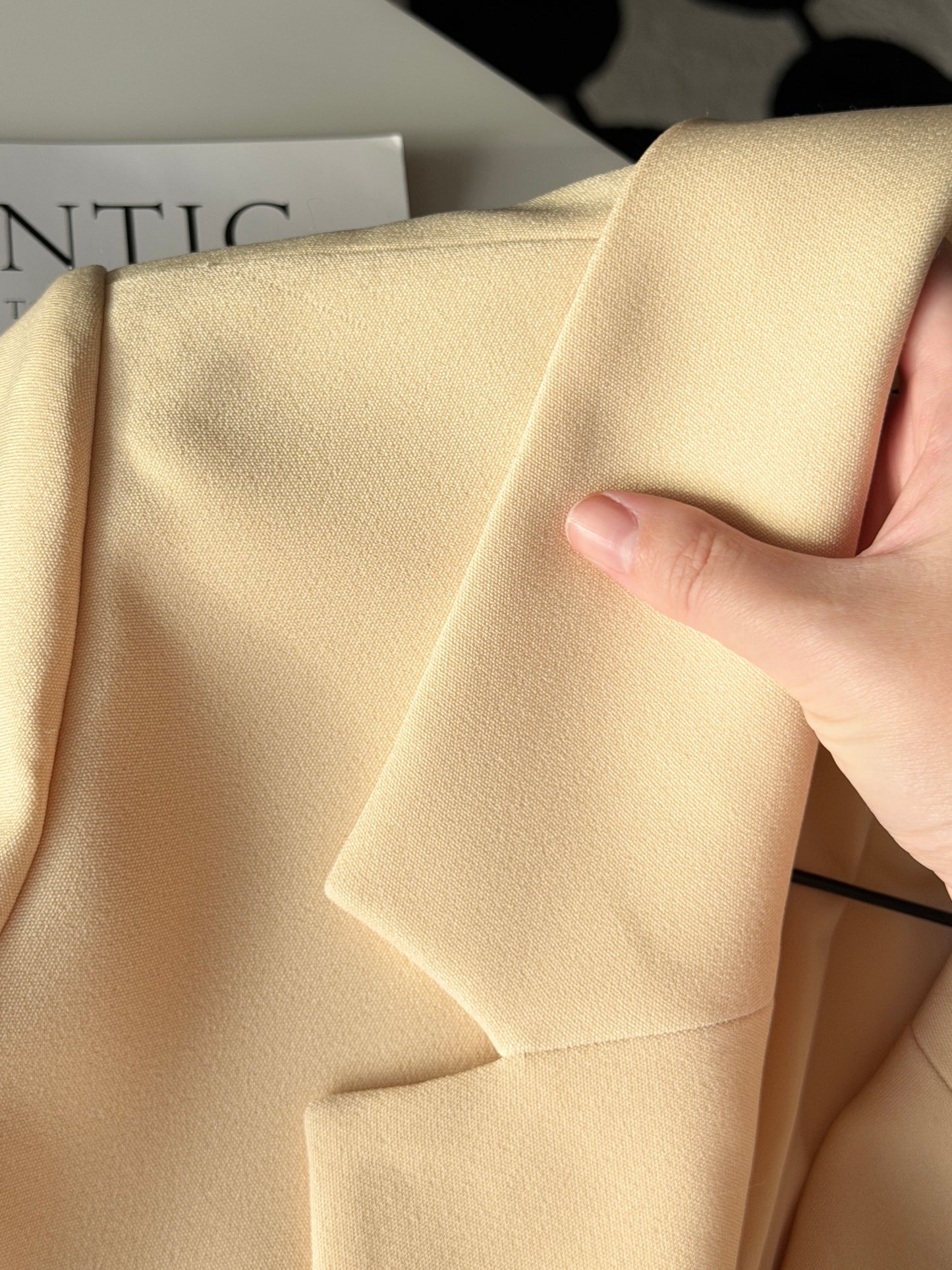 Stylish pale yellow long trench coat