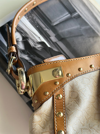 Vintage chic DKNY small bag with edgy details