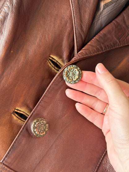 Vintage distressed leather jacket in rich brown tone