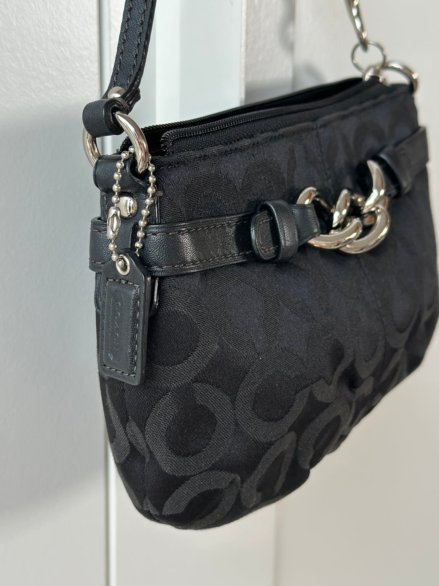 Timeless vintage authentic Coach wristlet bag