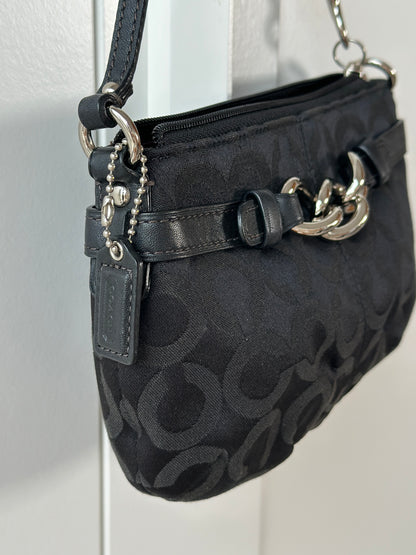 Timeless vintage authentic Coach wristlet bag