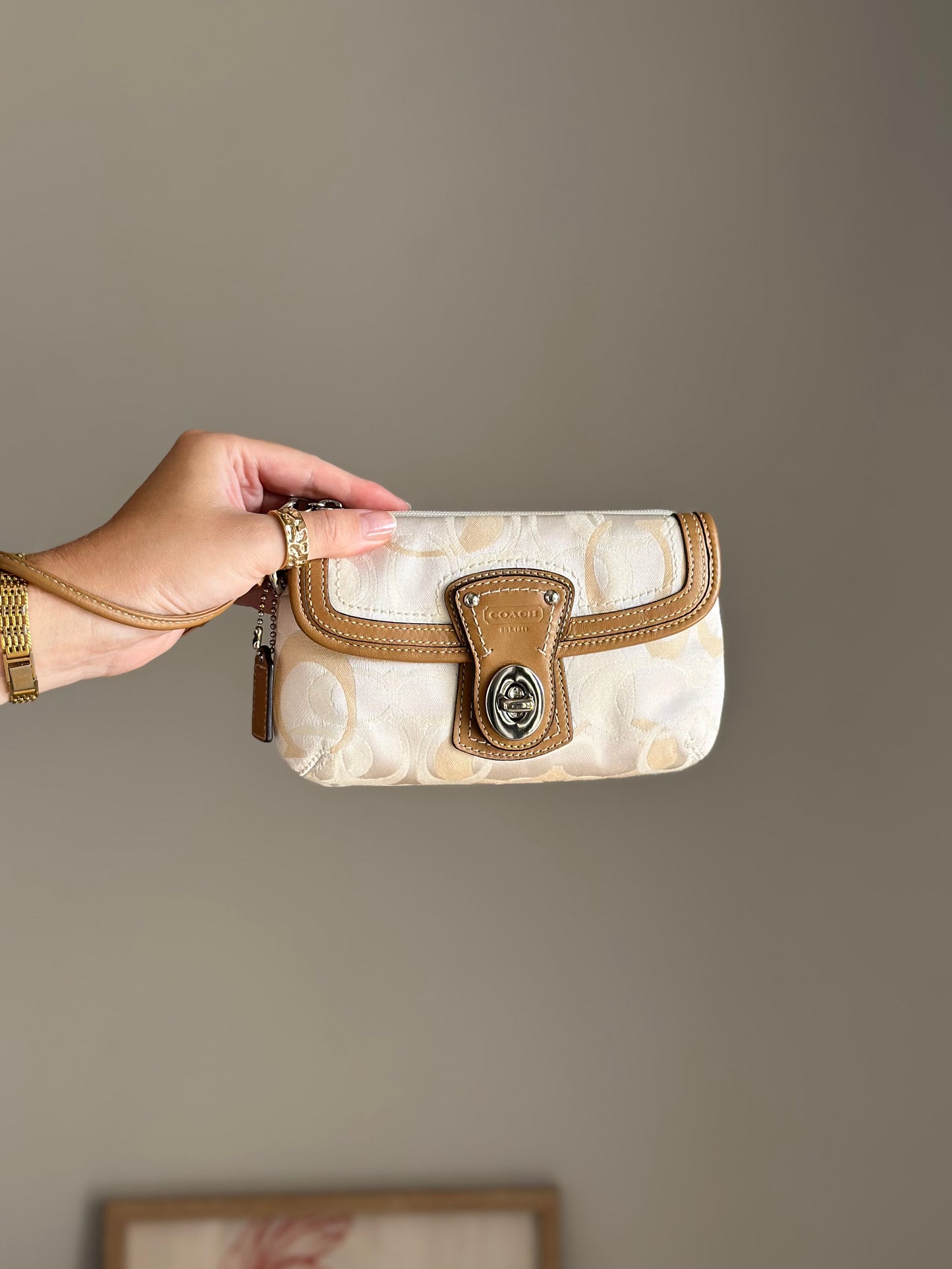 Amazing beige Y2K wristlet from Coach