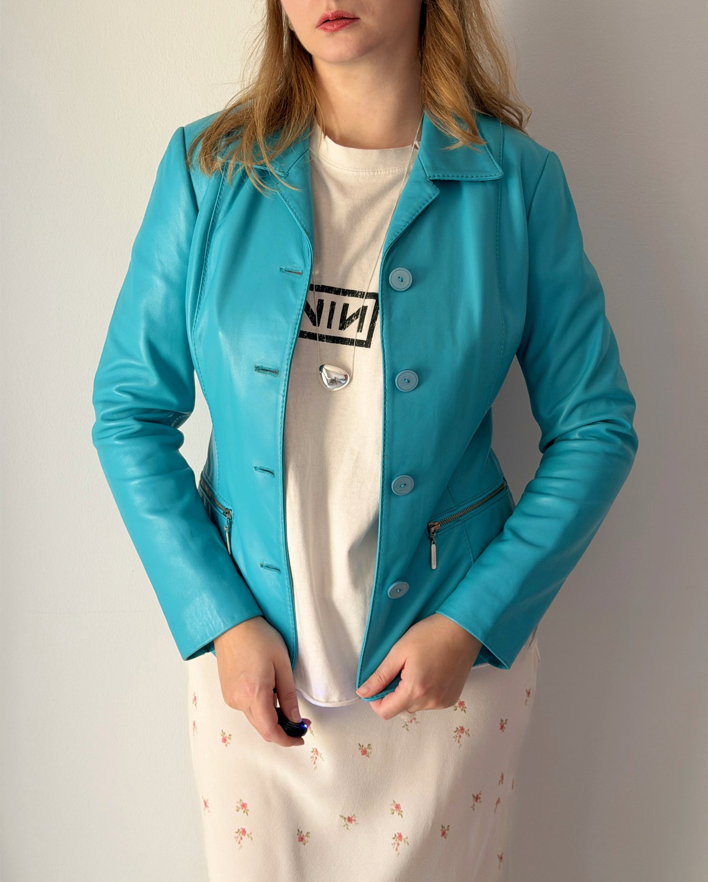 Vintage leather jacket in striking turquoise shade