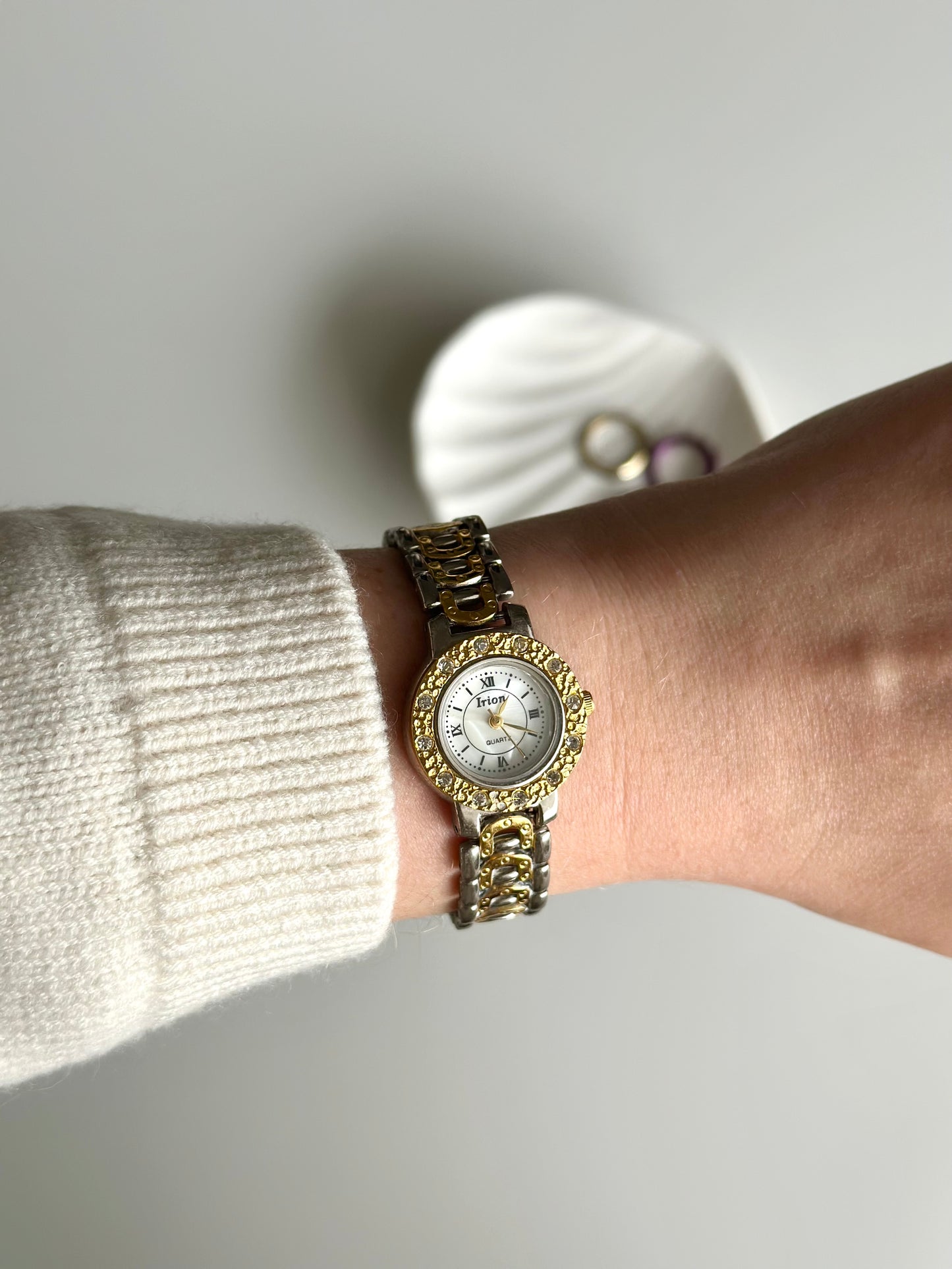 Stunning vintage two-tone watch with five interchangeable bezels