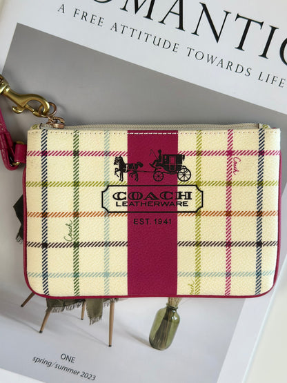 Lovely vintage Coach mini wristlet in playful plaid