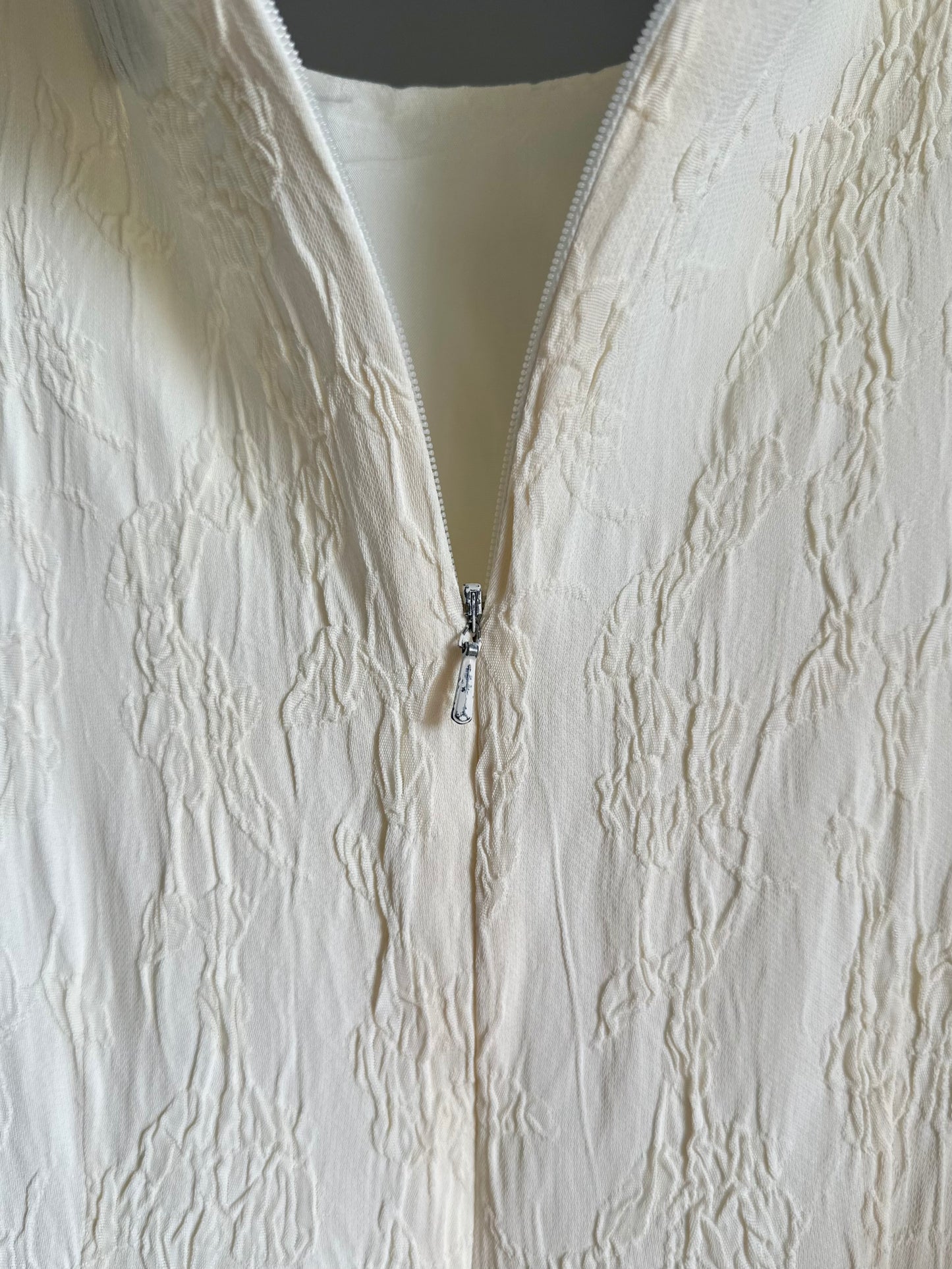 Elegant vintage midi dress in a soft cream tone