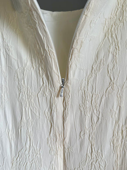 Elegant vintage midi dress in a soft cream tone