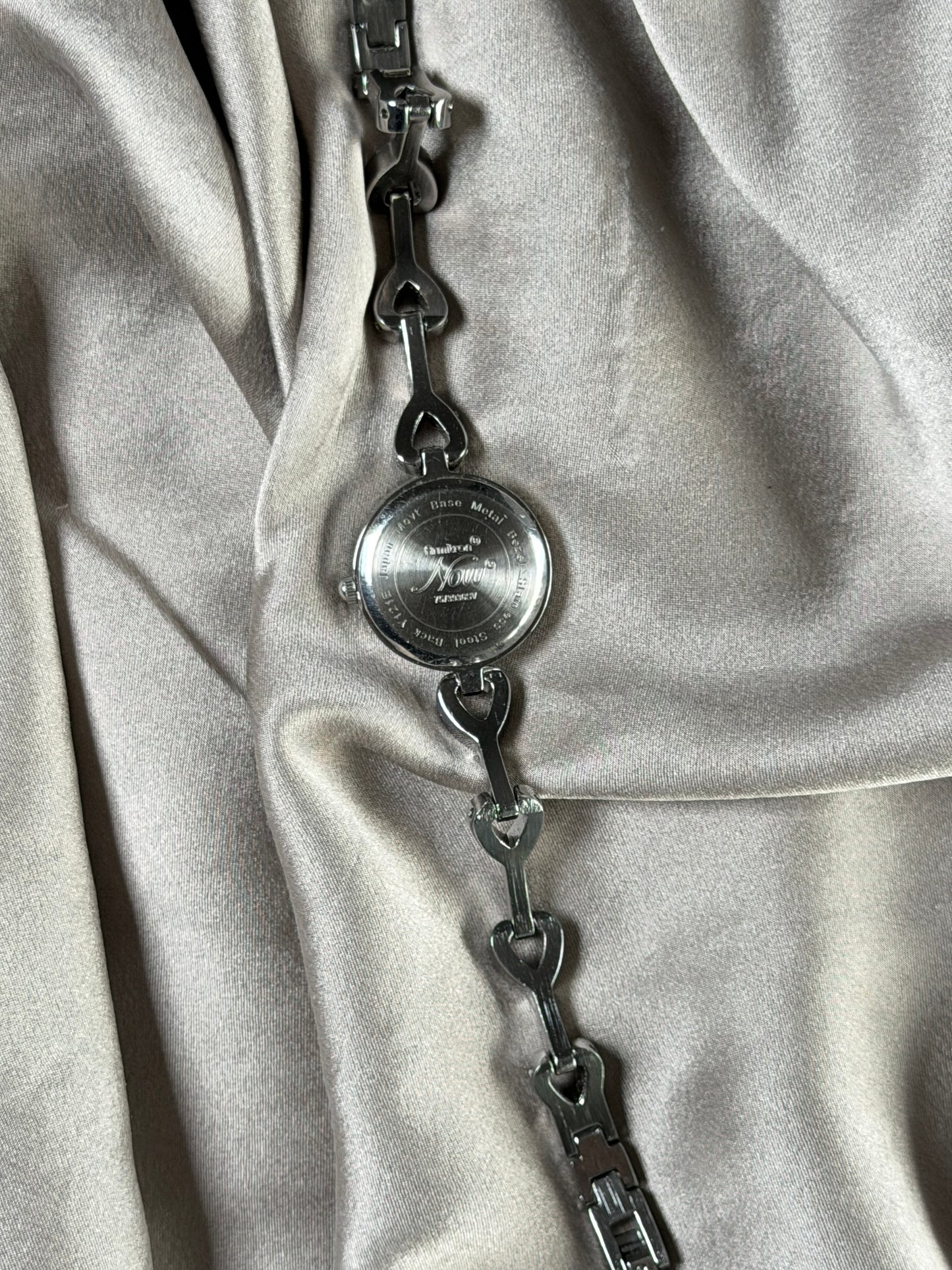 Charming vintage Armitron watch with heart links