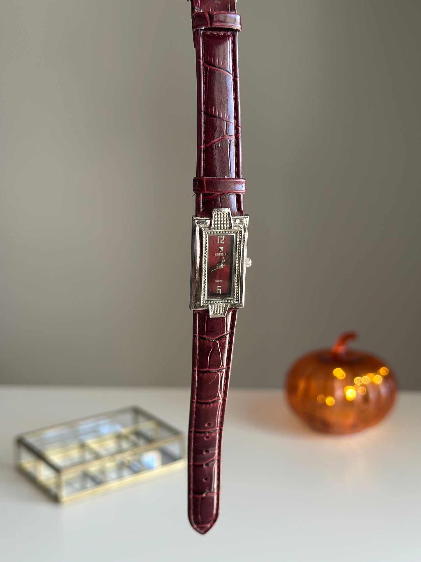 Classic watch with burgundy leather strap