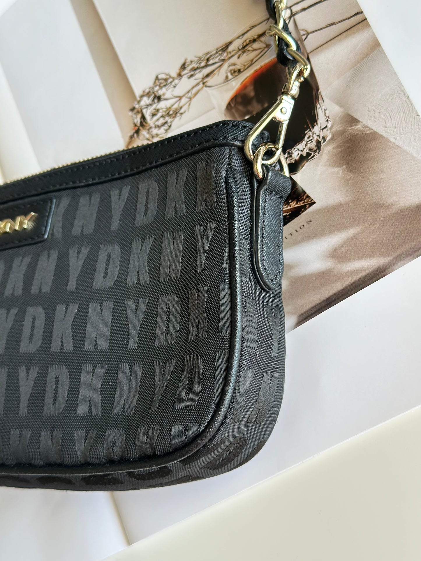Stunning pre-loved black DKNY baguette bag