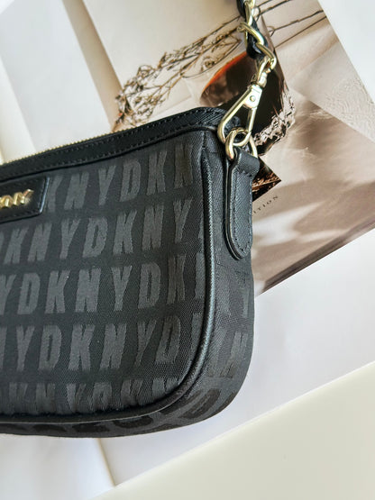 Stunning pre-loved black DKNY baguette bag