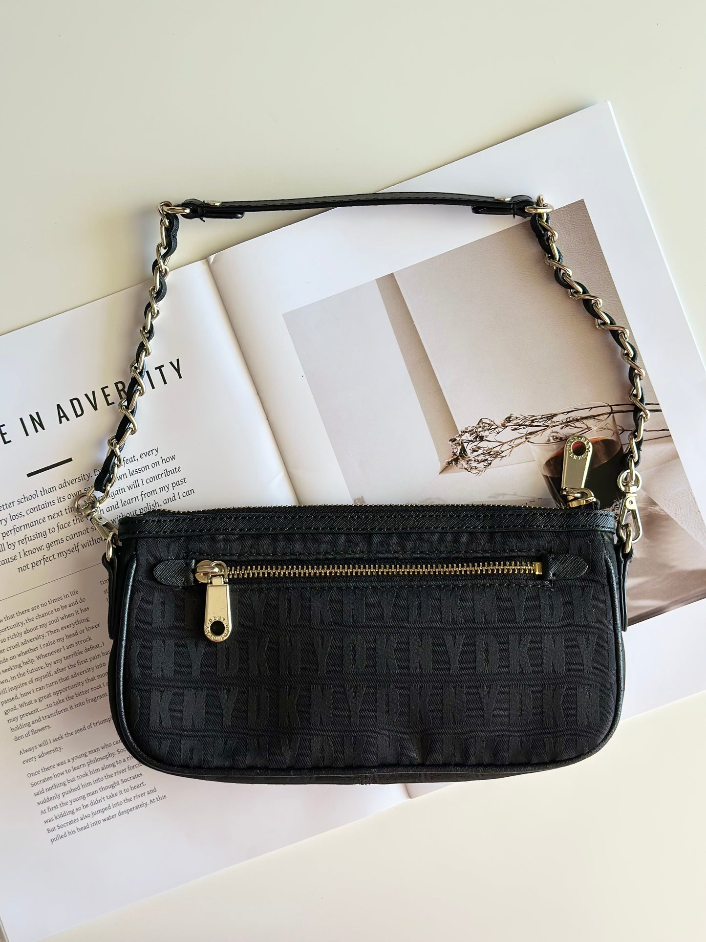 Stunning pre-loved black DKNY baguette bag