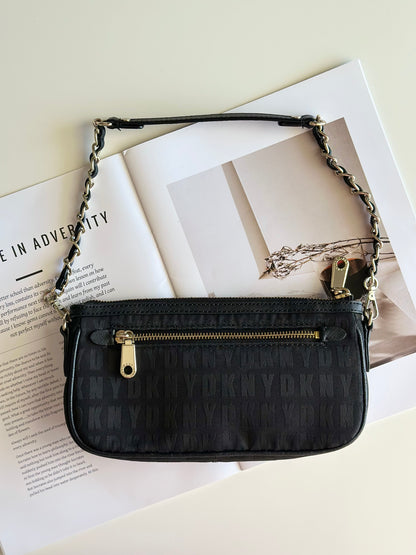 Stunning pre-loved black DKNY baguette bag