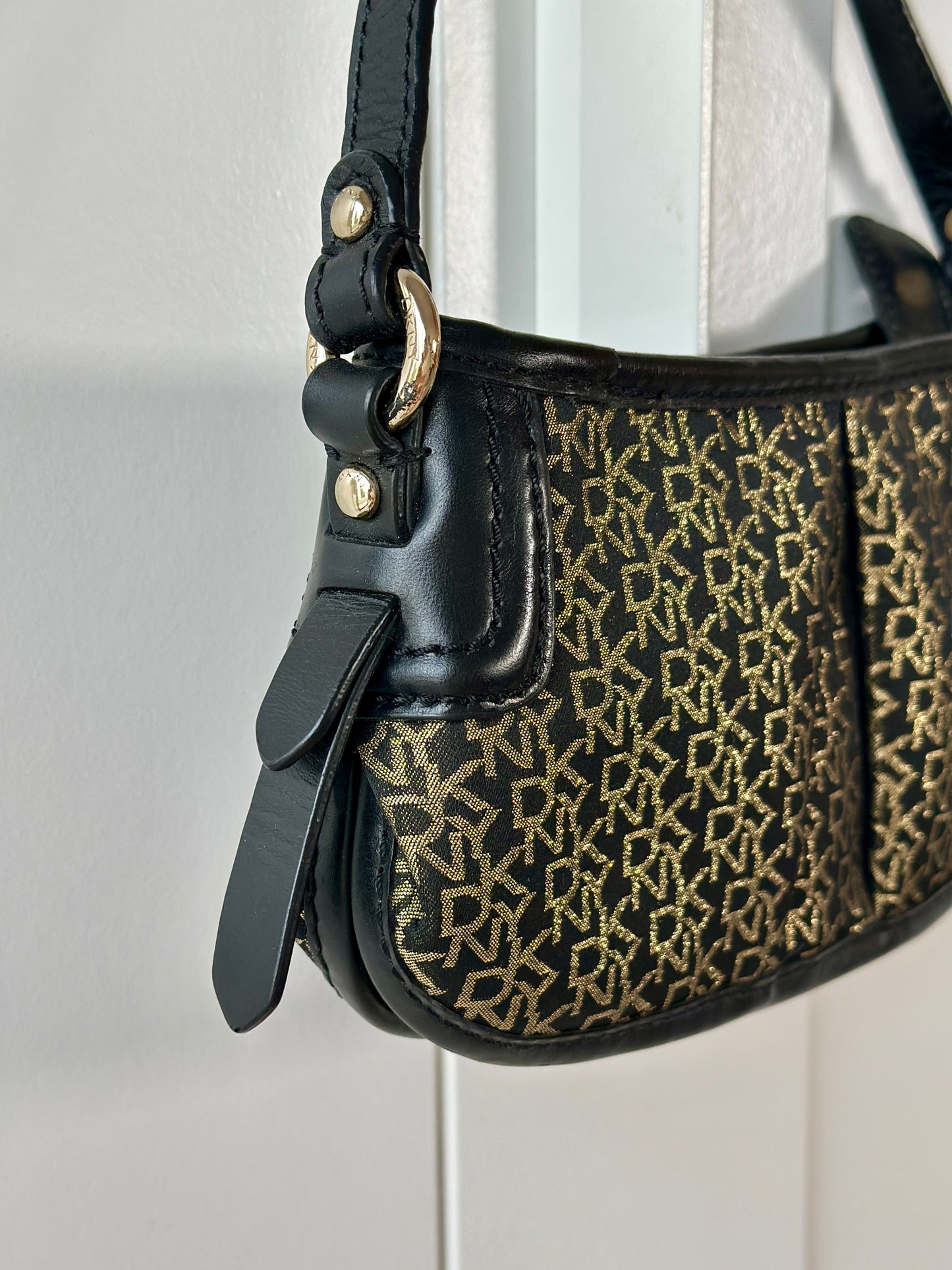 Chic vintage DKNY bag in black and gold