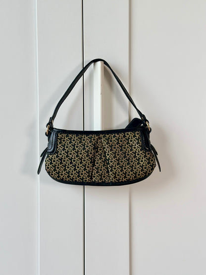 Chic vintage DKNY bag in black and gold