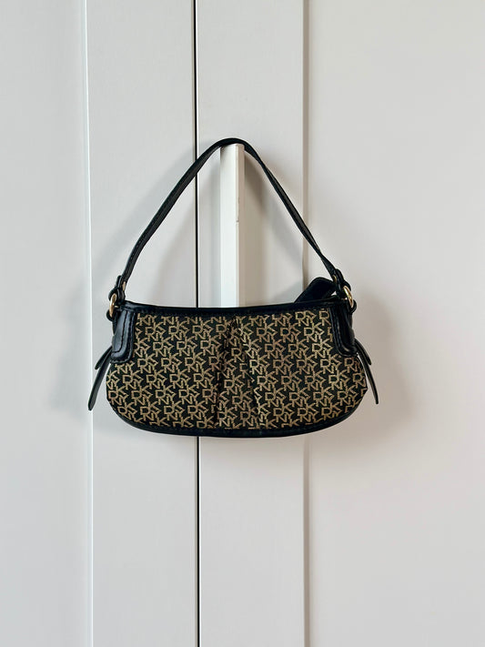 Chic vintage DKNY bag in black and gold