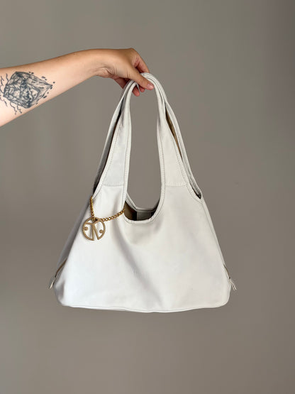 Stylish Coccinelle bag in soft white leather