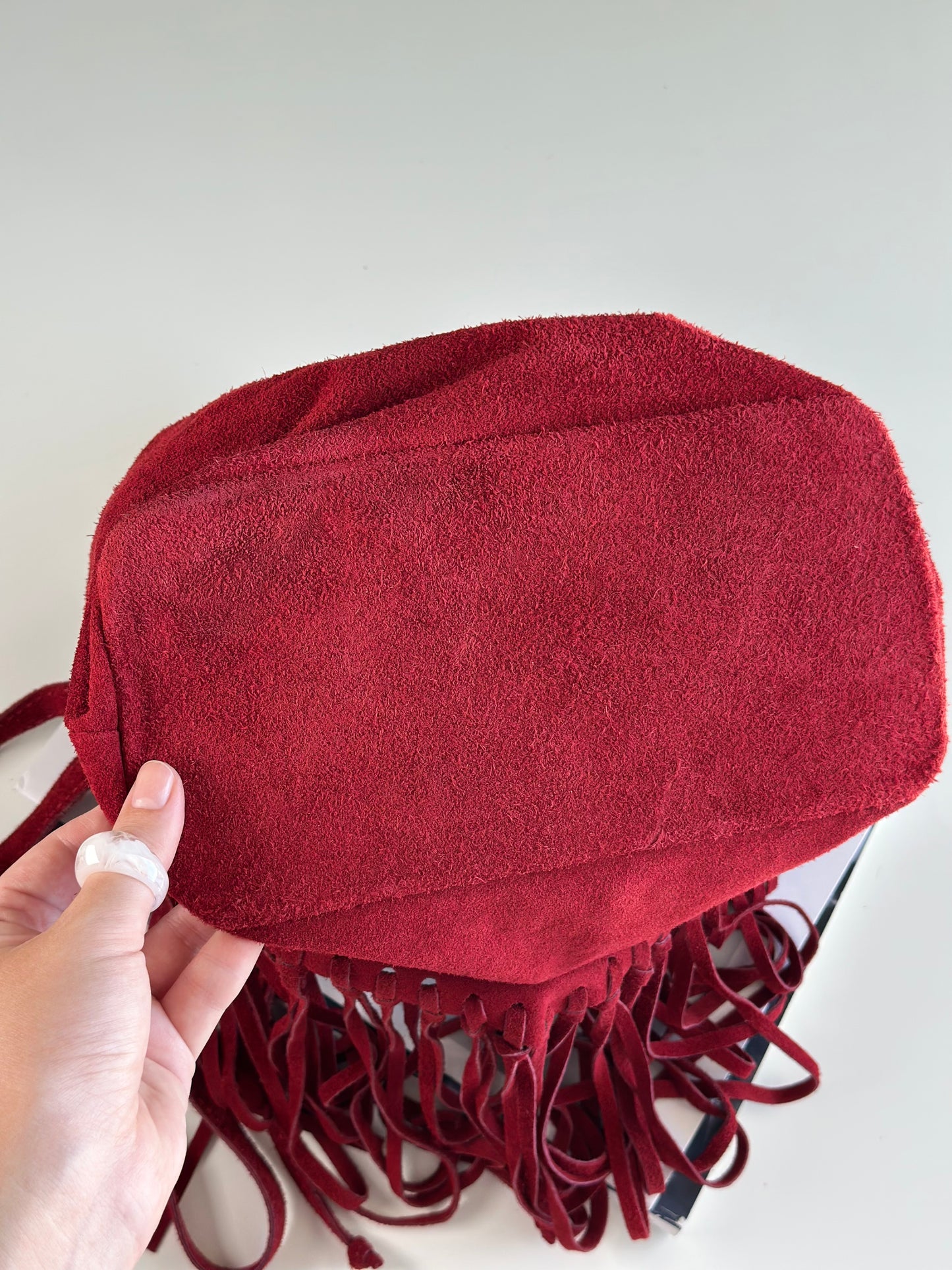 Dark red vintage suede bucket bag