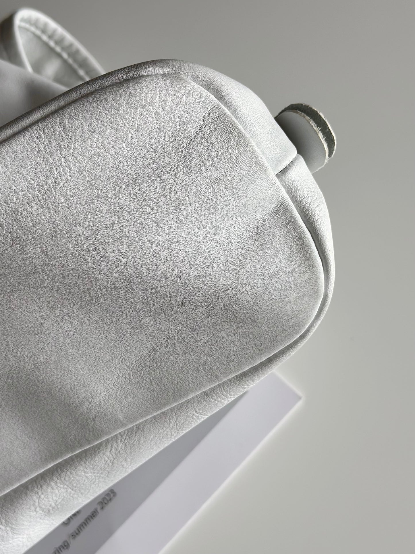Stylish Coccinelle bag in soft white leather
