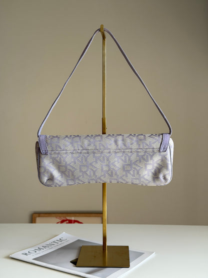 Charming vintage DKNY baguette bag in lilac colour