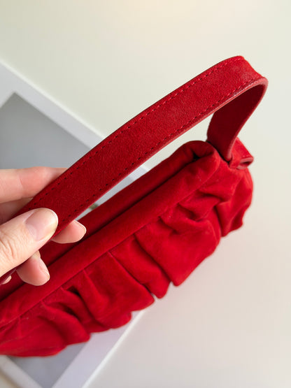 Vibrant red bag crafted from soft suede by Hobbs