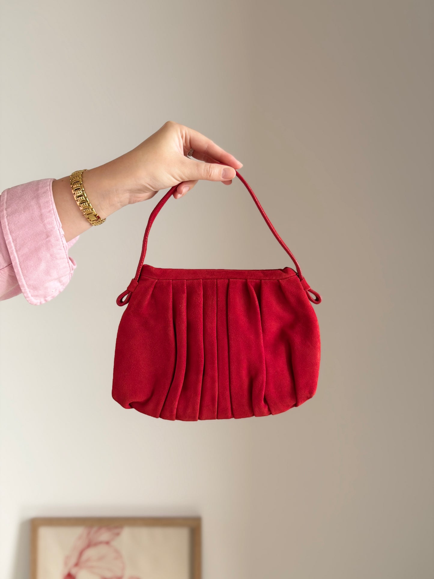 Vibrant red bag crafted from soft suede by Hobbs