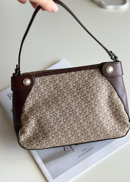 Vintage DKNY shoulder bag with a sleek, urban feel