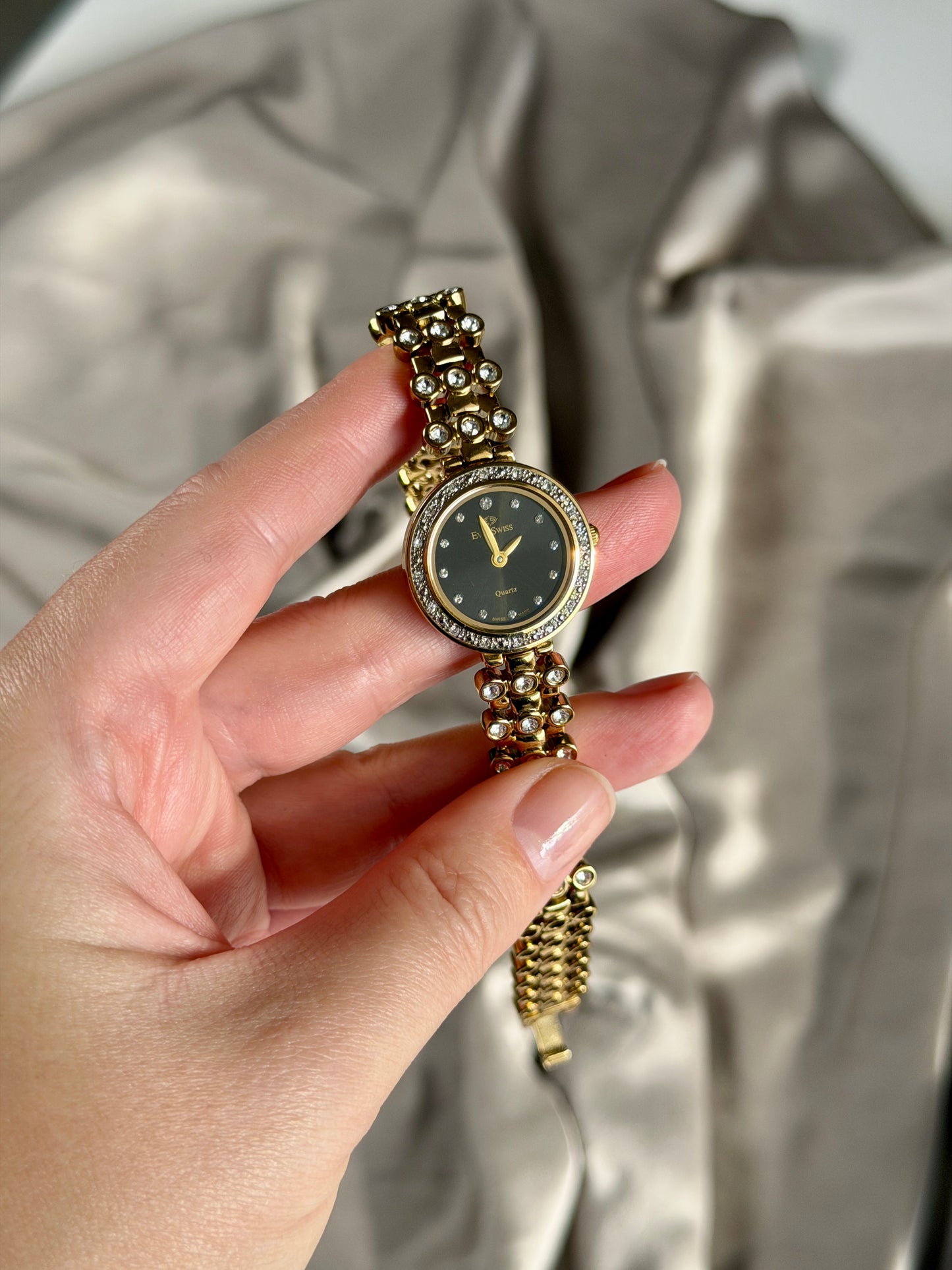 Elegant vintage gold-tone watch EverSwiss with black dial
