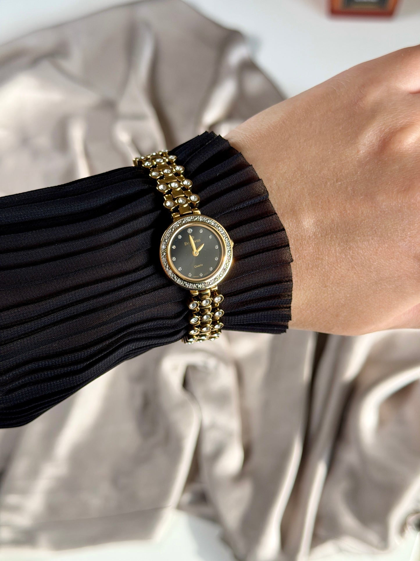 Elegant vintage gold-tone watch EverSwiss with black dial