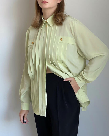 Beautiful vintage blouse in a pastel light green colour