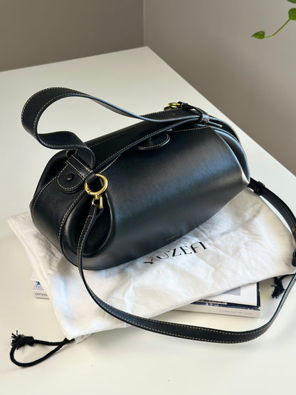 Stunning Yuzefi Loaf Bag crafted from black leather